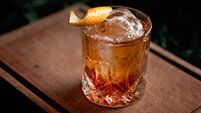 Old fashioned cocktail with an orange twist