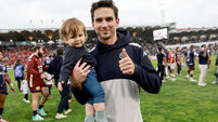 Joey Carbery with his son Beau after the game 12/4/2025