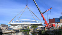 Watch: New pedestrian bridge lifted into place in Cork City