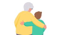Grandmother is hugging a grandson