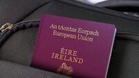 Close up of Ireland Passport in Black Suitcase Pocket