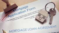 Mortgage application loan agreement and house key