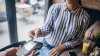 Woman making card payment