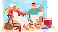 Older Couple Enjoys A Relaxing Day On A Sandy Beach, Sitting In Beach Chairs With Tropical Drinks In Hand