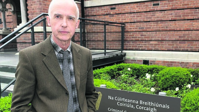 <p>‘Irish Examiner’ court reporter Liam Heylin at the Criminal Courts of Justice on Anglesea St in Cork. Amid the sometimes absurd and sometimes unsettling moments in criminal cases he covers, Liam notes trends and patterns in crimes coming before the courts. 	Picture: Dan Linehan</p>