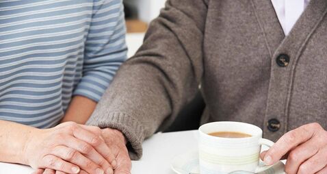 Advocacy.jpg Close Up Of Woman Sharing Cup Of Tea With Elderly Parent