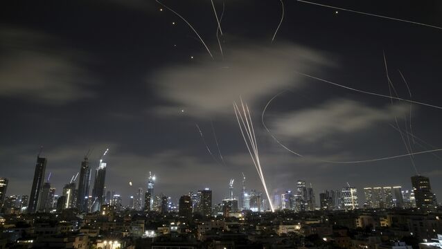 The Israeli Iron Dome air defense system fires to intercept missiles during an Iranian attack over Tel Aviv, Israel, early Wednesday June 18. <p>The Israeli Iron Dome air defense system fires to intercept missiles during an Iranian attack over Tel Aviv, Israel, early Wednesday June 18.</p>